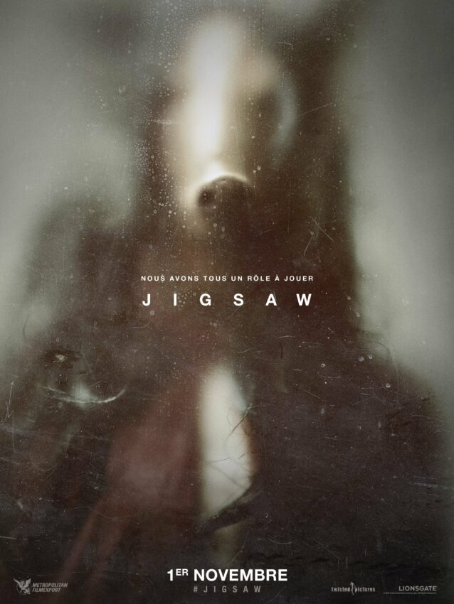 Affiche teaser du film Jigsaw avec la tagline "Nous avons tous un rôle à jouer"