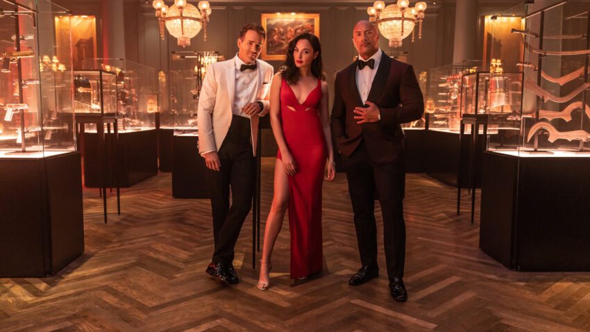 Bannière du film Red Notice réalisé par Rawson Marshall Thurber avec Ryan Reynolds, Gal Gadot et Dwayne Johnson
